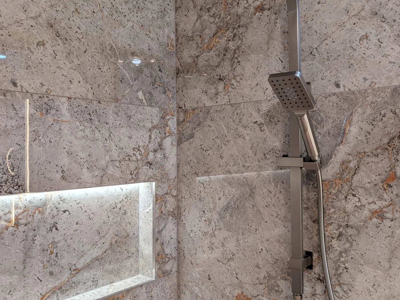 Quakers Hill family bathroom after renovation with wall-hung vanity and backlit mirror