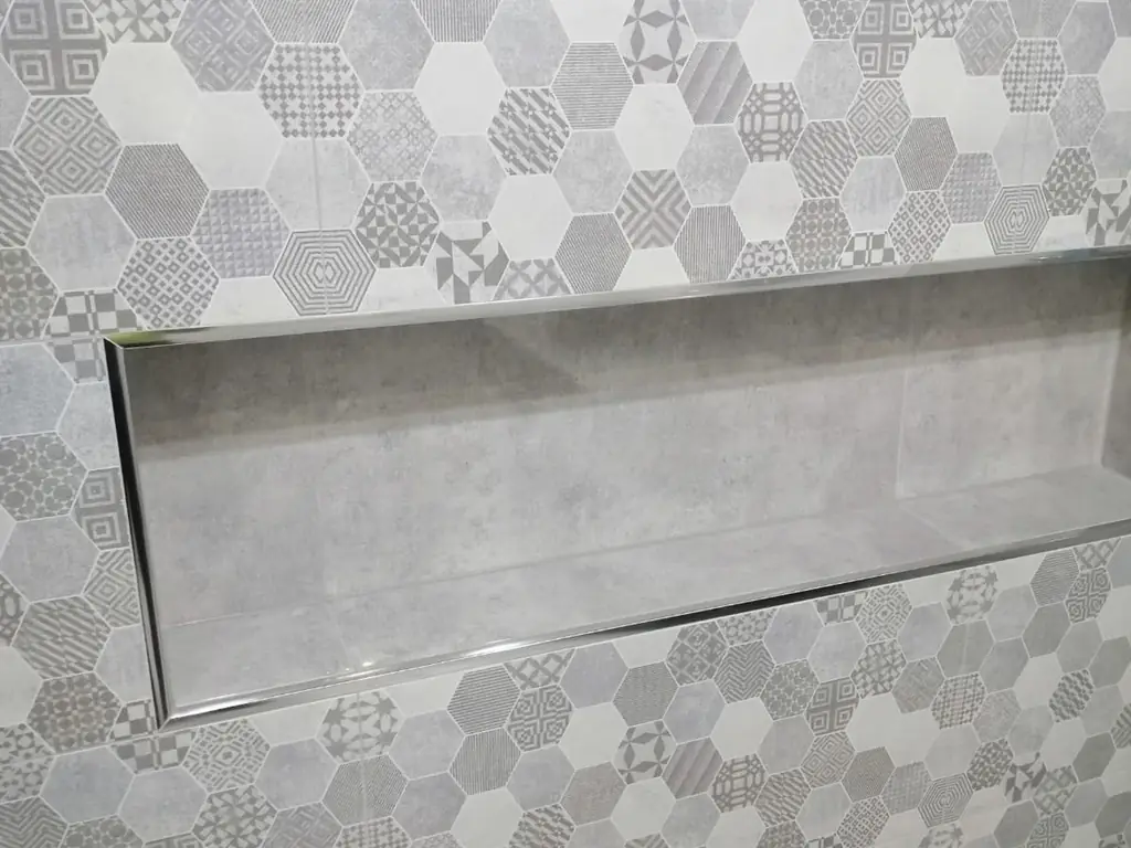 Hobless walk-in shower with grab rail blocking and slip-resistant tile in a Minto bathroom renovation