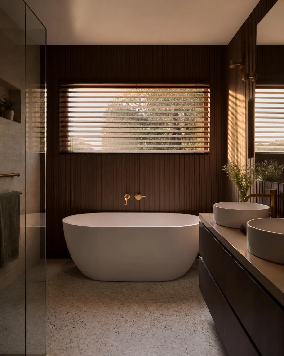 Accessible bathroom renovation with a step-free shower, seat and discreet grab rail